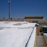 Dura-Foam commercial roofing with skylights visible