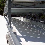 Commercial solar roof. View under solar panels