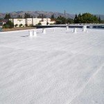 Spray foam on flat building roof