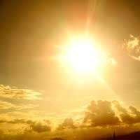 Bright sun and clouds