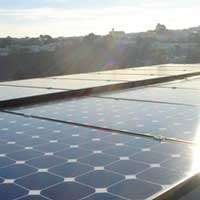 Dura-Foam solar roof overlooking neighborhood hills